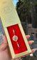 Crystal Rakhi with Gold Packaging